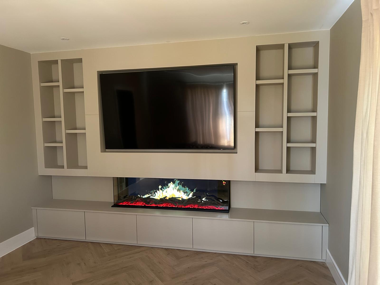 After — media wall painted white with TV