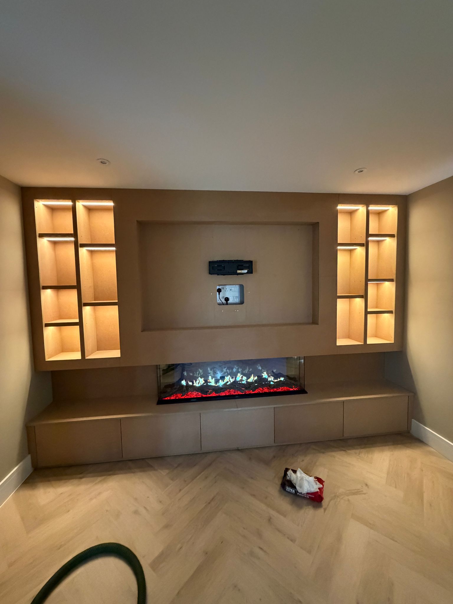 Before — media wall and fireplace surround